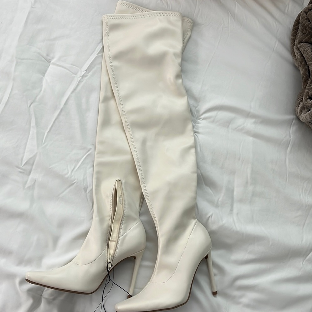 White thigh-high pointy boots